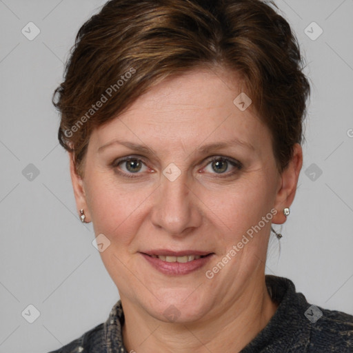 Joyful white adult female with medium  brown hair and grey eyes