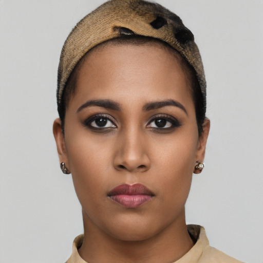 Neutral latino young-adult female with short  brown hair and brown eyes