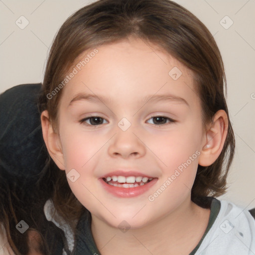 Joyful white child female with medium  brown hair and brown eyes