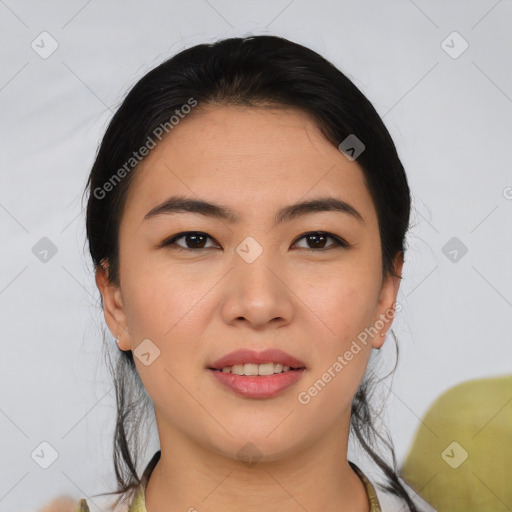 Joyful asian young-adult female with medium  black hair and brown eyes