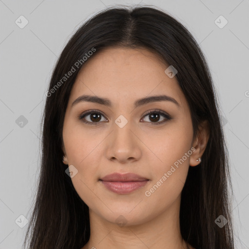 Joyful latino young-adult female with long  brown hair and brown eyes