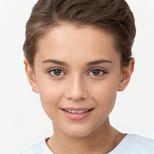 Joyful white child female with short  brown hair and brown eyes