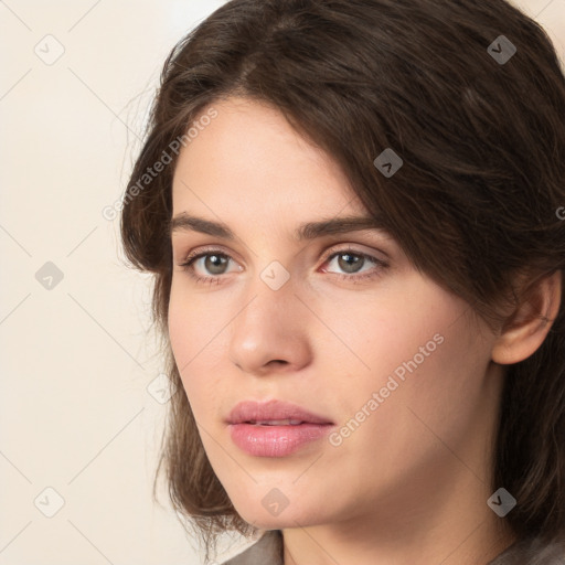 Neutral white young-adult female with medium  brown hair and grey eyes