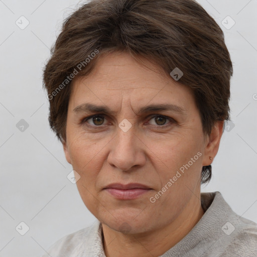 Joyful white adult female with short  brown hair and brown eyes