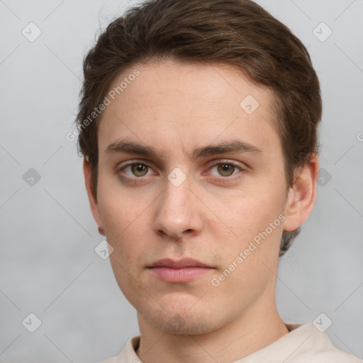 Neutral white young-adult male with short  brown hair and grey eyes