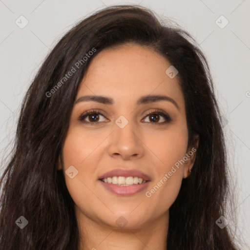 Joyful latino young-adult female with long  brown hair and brown eyes