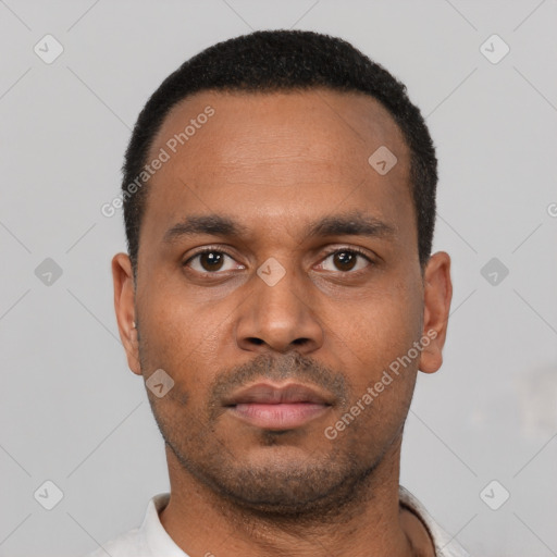 Neutral latino young-adult male with short  black hair and brown eyes