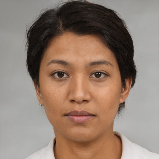 Neutral asian young-adult female with short  brown hair and brown eyes