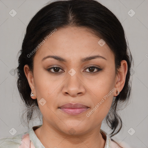 Joyful latino young-adult female with medium  brown hair and brown eyes