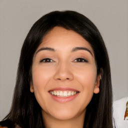 Joyful white young-adult female with long  black hair and brown eyes