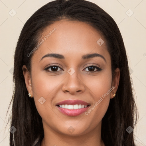 Joyful white young-adult female with long  brown hair and brown eyes