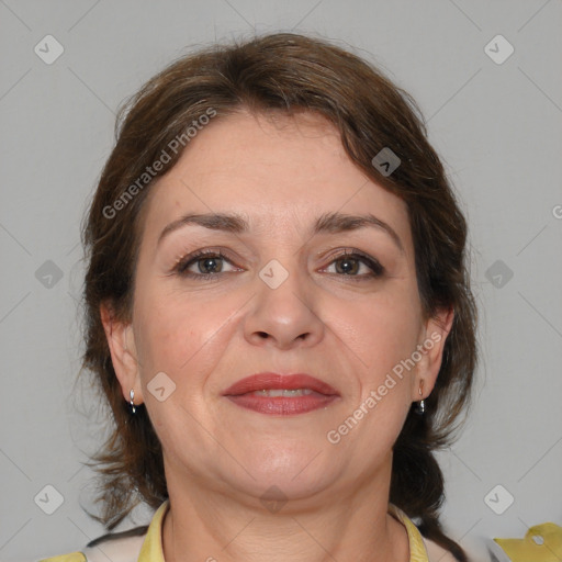 Joyful white adult female with medium  brown hair and brown eyes