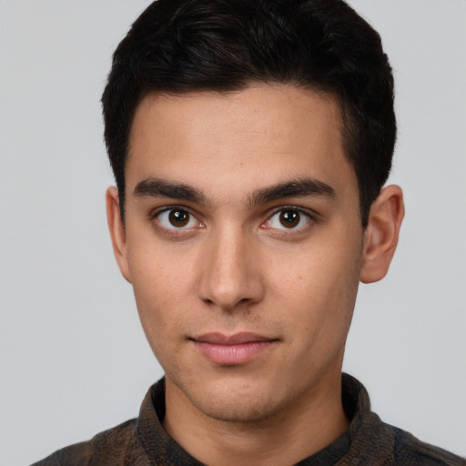 Neutral white young-adult male with short  brown hair and brown eyes