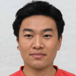 Neutral asian young-adult male with short  black hair and brown eyes