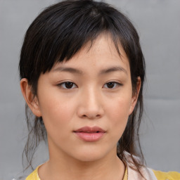 Neutral asian young-adult female with medium  brown hair and brown eyes