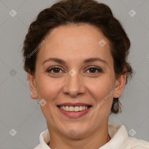 Joyful white adult female with short  brown hair and brown eyes