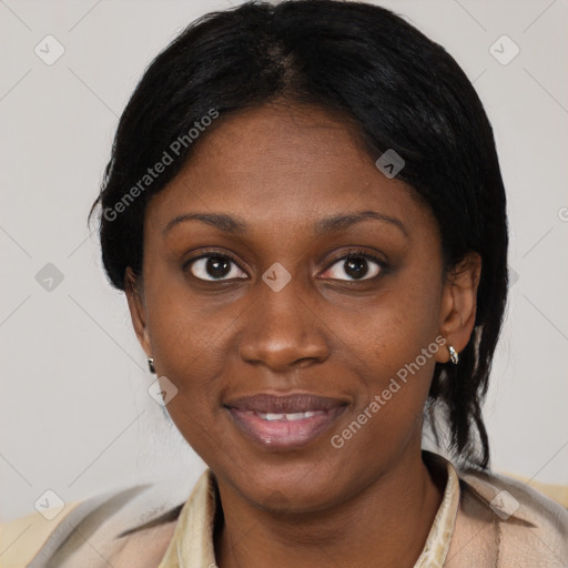 Joyful black young-adult female with short  black hair and brown eyes