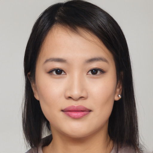 Neutral asian young-adult female with medium  black hair and brown eyes