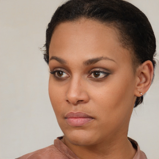 Neutral black young-adult female with short  brown hair and brown eyes