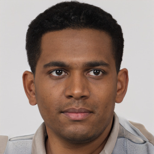 Neutral latino young-adult male with short  brown hair and brown eyes