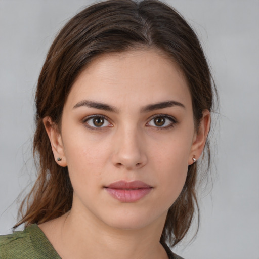 Neutral white young-adult female with medium  brown hair and brown eyes