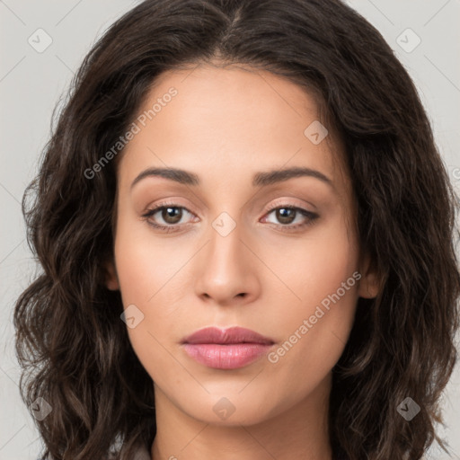 Neutral white young-adult female with long  brown hair and brown eyes