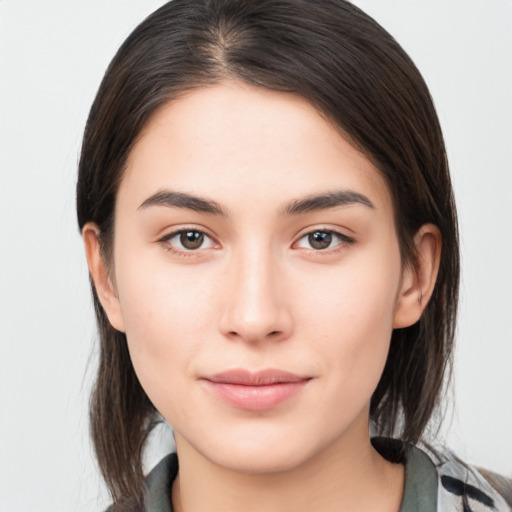 Neutral white young-adult female with medium  brown hair and brown eyes