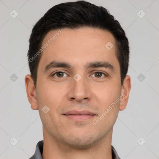 Joyful white young-adult male with short  brown hair and brown eyes