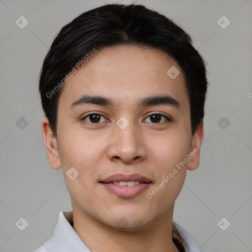 Joyful white young-adult male with short  black hair and brown eyes