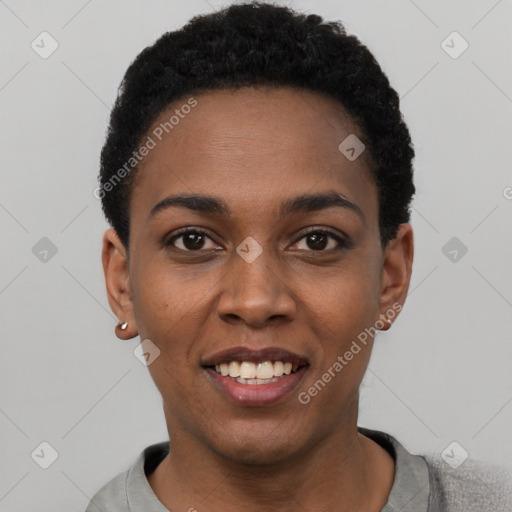 Joyful black young-adult female with short  black hair and brown eyes