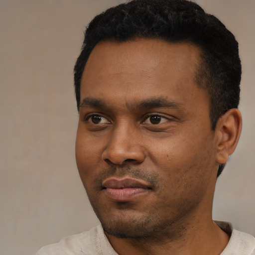 Neutral black young-adult male with short  black hair and brown eyes