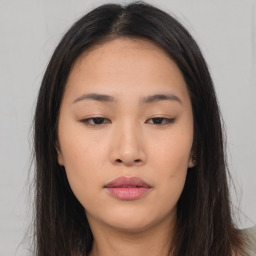 Neutral asian young-adult female with long  brown hair and brown eyes