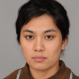 Neutral asian young-adult female with medium  brown hair and brown eyes