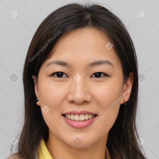 Joyful asian young-adult female with medium  brown hair and brown eyes