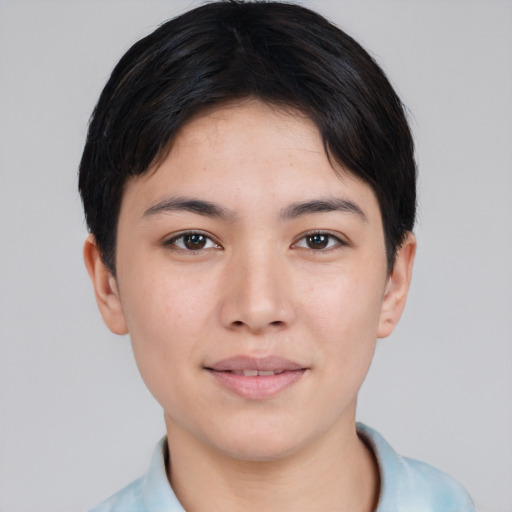 Joyful asian young-adult female with short  black hair and brown eyes