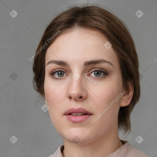 Neutral white young-adult female with medium  brown hair and grey eyes