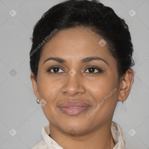 Joyful latino adult female with short  brown hair and brown eyes