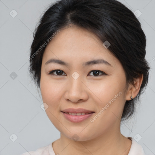 Joyful asian young-adult female with medium  brown hair and brown eyes