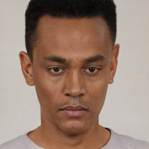 Neutral black young-adult male with short  black hair and brown eyes
