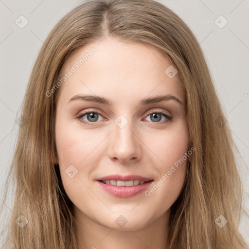 Joyful white young-adult female with long  brown hair and green eyes