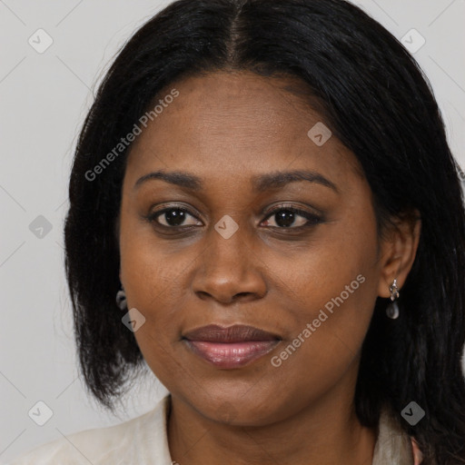 Joyful latino young-adult female with long  black hair and brown eyes