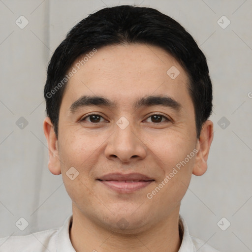 Joyful asian young-adult male with short  black hair and brown eyes