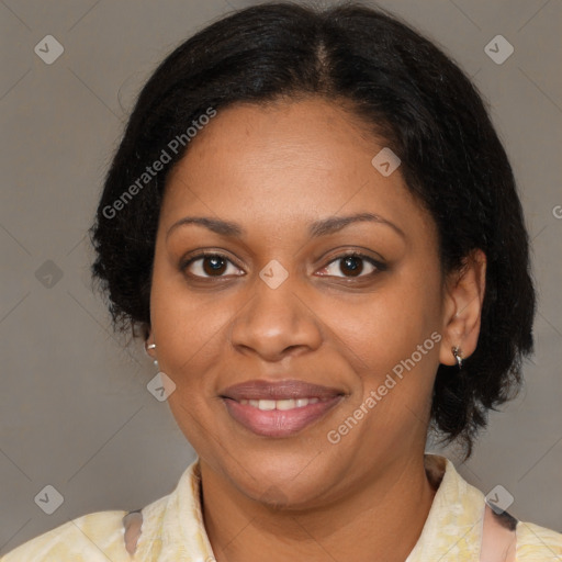 Joyful black young-adult female with medium  brown hair and brown eyes