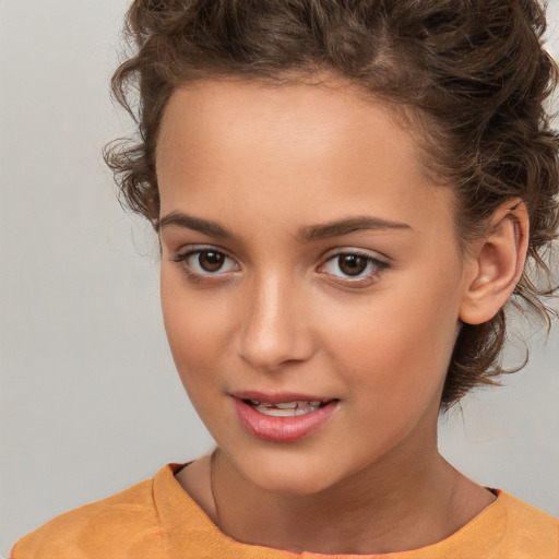 Joyful white child female with medium  brown hair and brown eyes