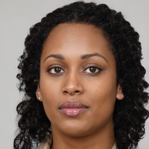 Neutral black young-adult female with long  black hair and brown eyes
