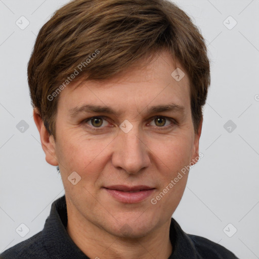 Joyful white adult male with short  brown hair and grey eyes