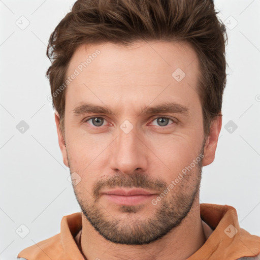 Neutral white young-adult male with short  brown hair and grey eyes