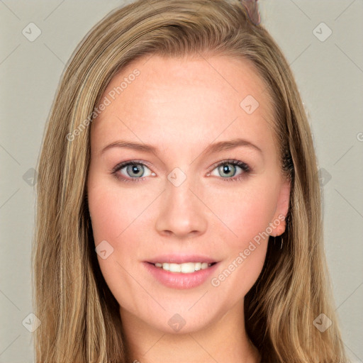 Joyful white young-adult female with long  brown hair and grey eyes