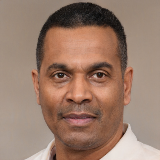 Neutral latino adult male with short  black hair and brown eyes