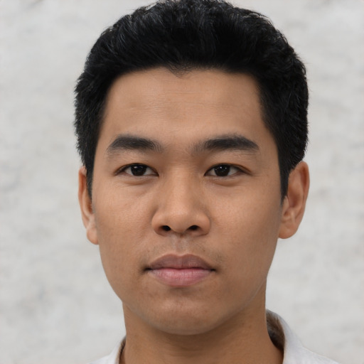 Neutral asian young-adult male with short  black hair and brown eyes